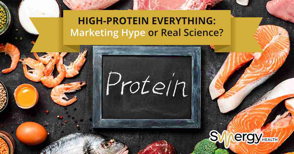 Protein sources food variety showcasing lean meats, eggs, legumes, and dairy, highlighting Synergy Health’s wellness and nutrition-focused healthcare services.
