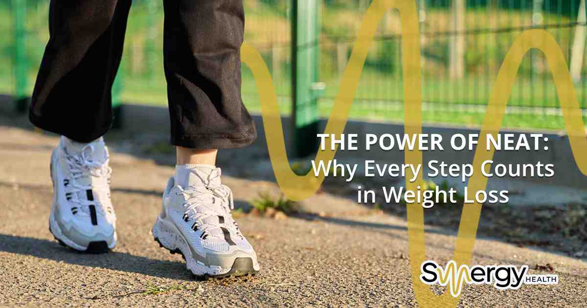 Person taking active steps during an outdoor walk, representing Synergy Health services focused on movement, wellness, and healthy living.