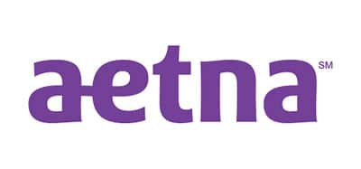 Aetna logo displayed on the Synergy Health website, highlighting accepted insurance coverage and healthcare services offered by Synergy Health.