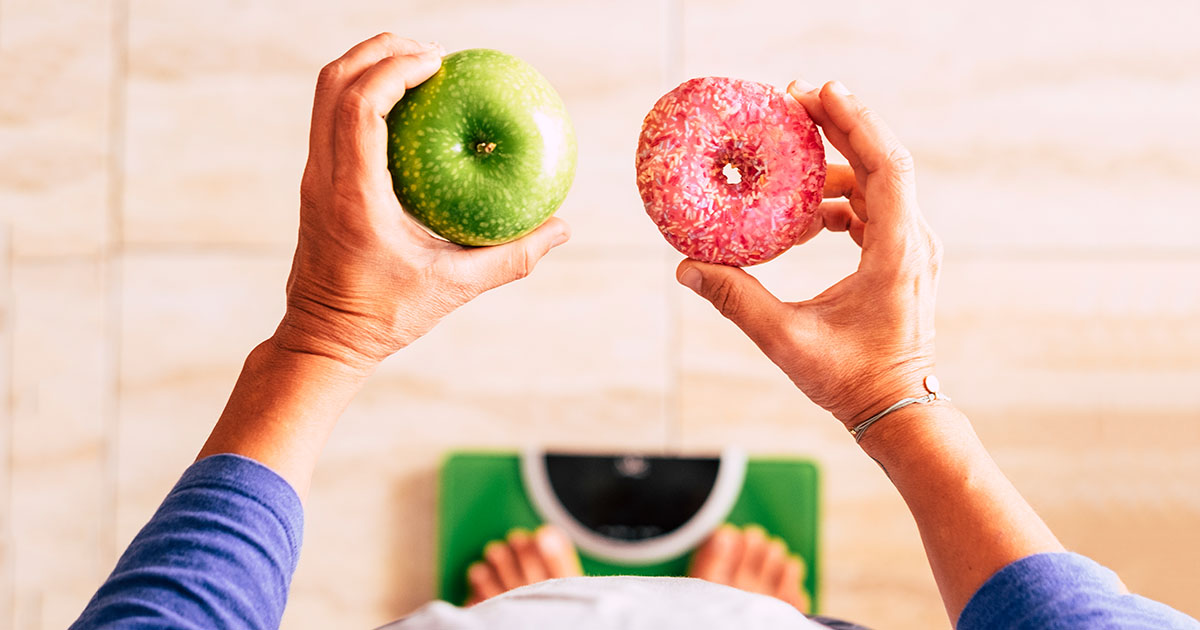 Illustration of weighing healthy choices, showing an apple versus a donut, representing Synergy Health and its wellness-focused services.